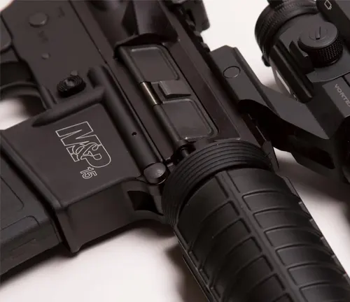 Close-up of a Smith & Wesson M&P 15 rifle focusing on the receiver area