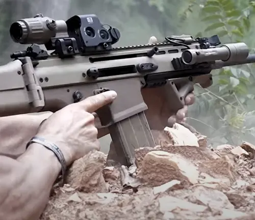Person aiming an FN SCAR 17S rifle with dual mounted sight
