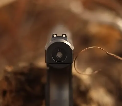 Front view of an HK P7 PSP pistol barrel and sight.