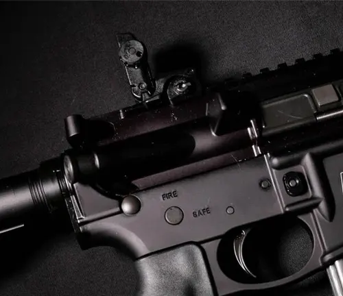 Detailed view of a Smith & Wesson M&P 15 rifle's upper receiver showing the fire control selector and optics mount