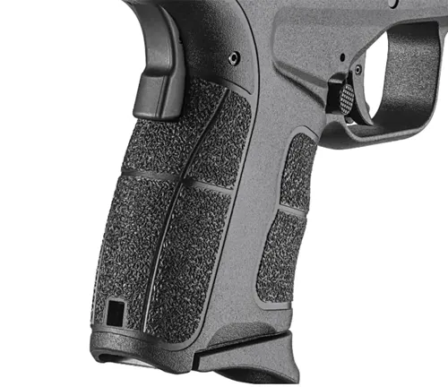 Close-up of the grip and trigger section of a Springfield XD-S handgun