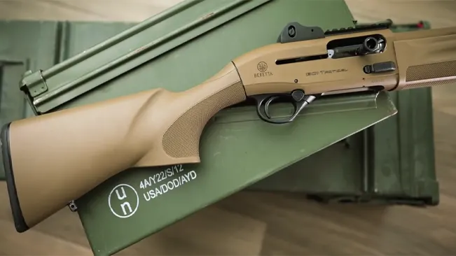 Semi-automatic Beretta 1301 Tactical shotgun with a tan stock