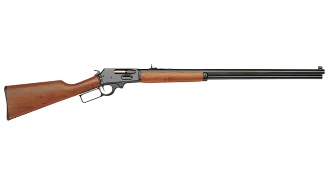 Classic Marlin 1895 lever-action rifle with a wooden stock and blued steel barrel, isolated on a white background.