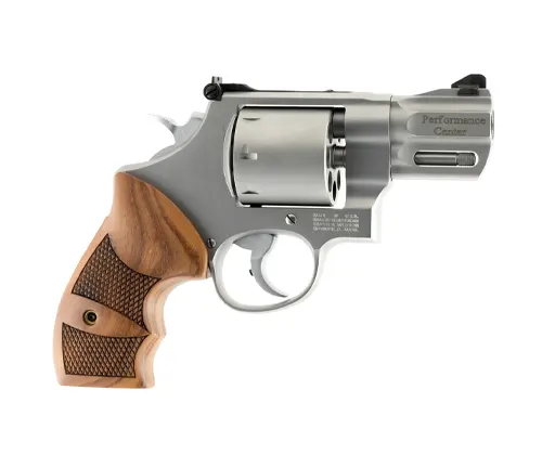 A Smith & Wesson 627 revolver with a stainless steel finish and wooden grip.