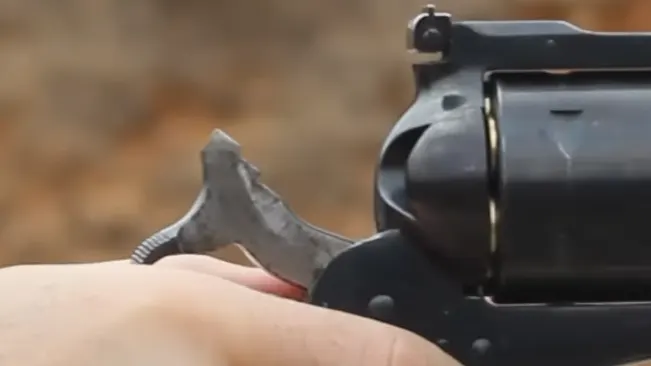 Close-up of the hammer and rear sight of a Ruger Super Blackhawk .44 revolver.