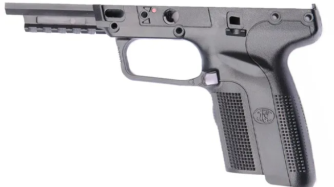 Side view of a FN Five-SeveN pistol showing its profile and controls.