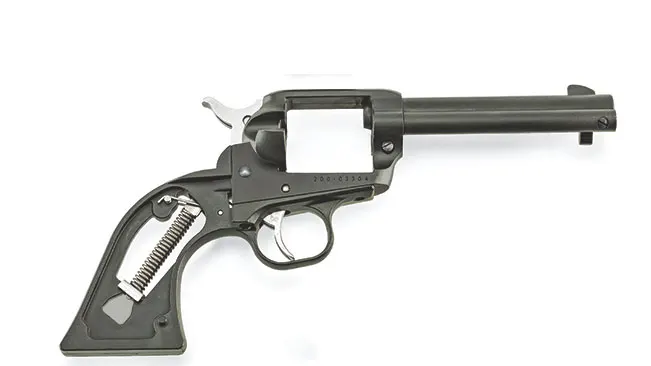 Black Ruger Wrangler 22LR revolver with exposed hammer and long barrel, against a white background.