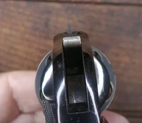 Rear view of a S&W Model 49 Bodyguard revolver focusing on the sight.