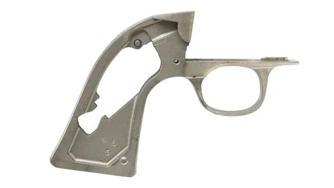 Metal frame of a Ruger Single-Six revolver without the cylinder and grips on a white background.
