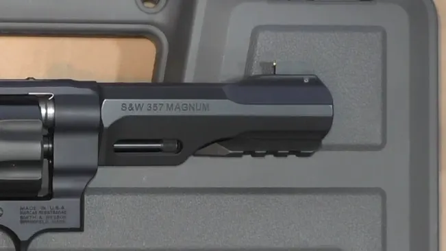 Detail of S&W 357 Magnum barrel on a TRR8 revolver in a case.