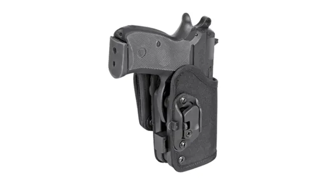 A CZ-75 PCR pistol in a black Kydex holster with an attached magazine pouch.