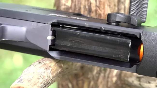 Close-up of an open bolt and chamber of a shotgun 