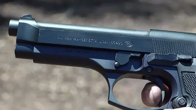 an image of Beretta M9 open slide