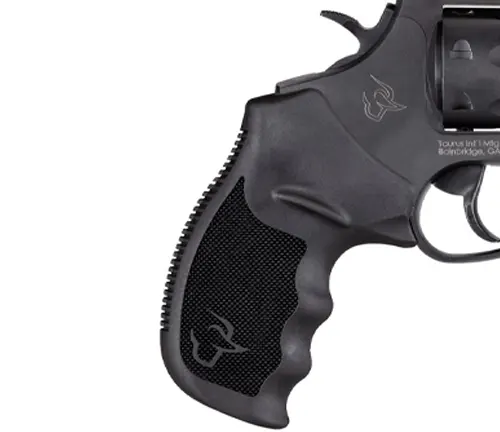 Close-up of the grip and logo on a Taurus Tracker 17 revolver.