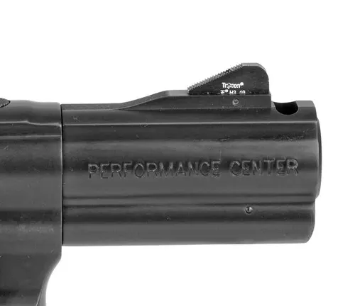 Close-up of the barrel of a Smith & Wesson Performance Center firearm, with text branding visible.