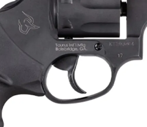 Close-up of the cylinder and trigger area of a Taurus Tracker 17 revolver, highlighting the model number.