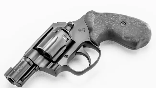 Colt Night Cobra revolver with a matte finish and textured grip on a white background.