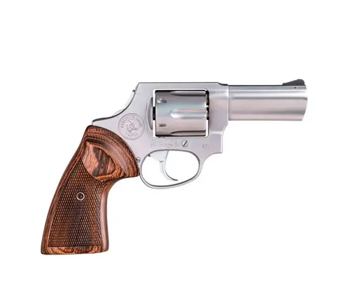 Taurus 856 Executive Grade revolver with stainless steel finish and wooden grips.